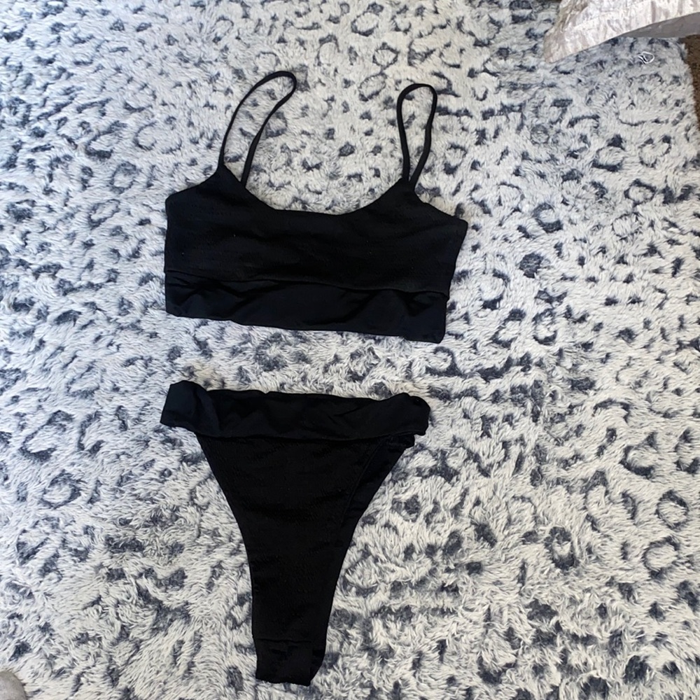 All black bathing suit